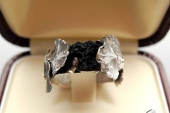 Custom made silver ring with a piece of lava (brought from a Volcano top by the Client), decorated with a tropical leaves motive.