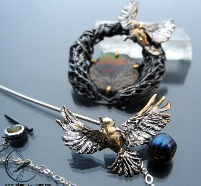 silver brooch with black opal and nightingales